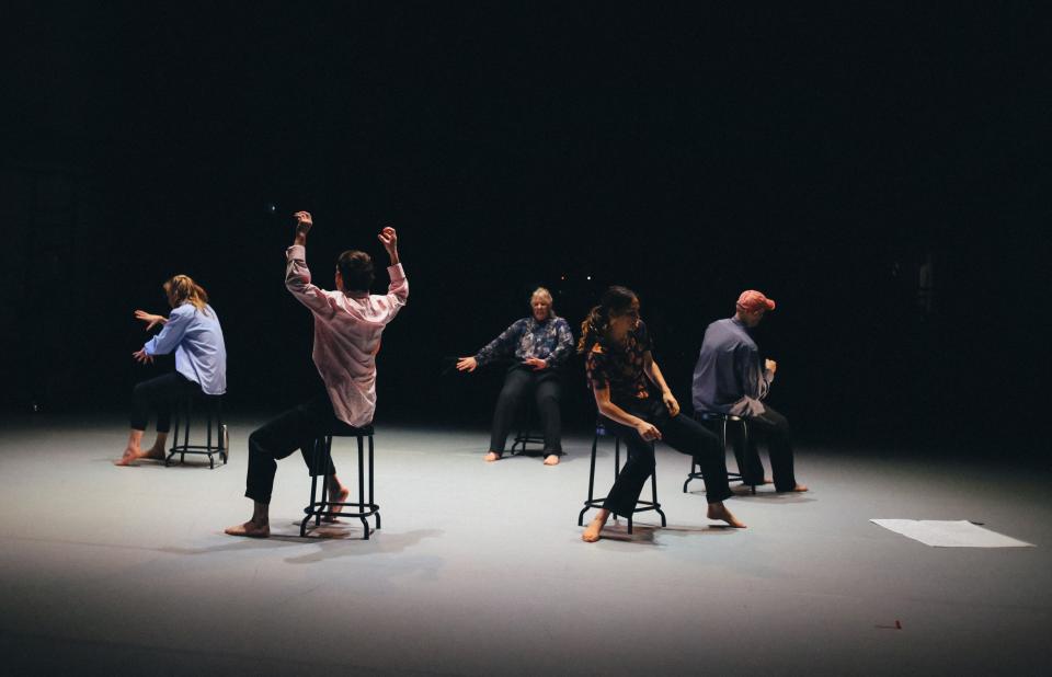 5 dancers on chairs